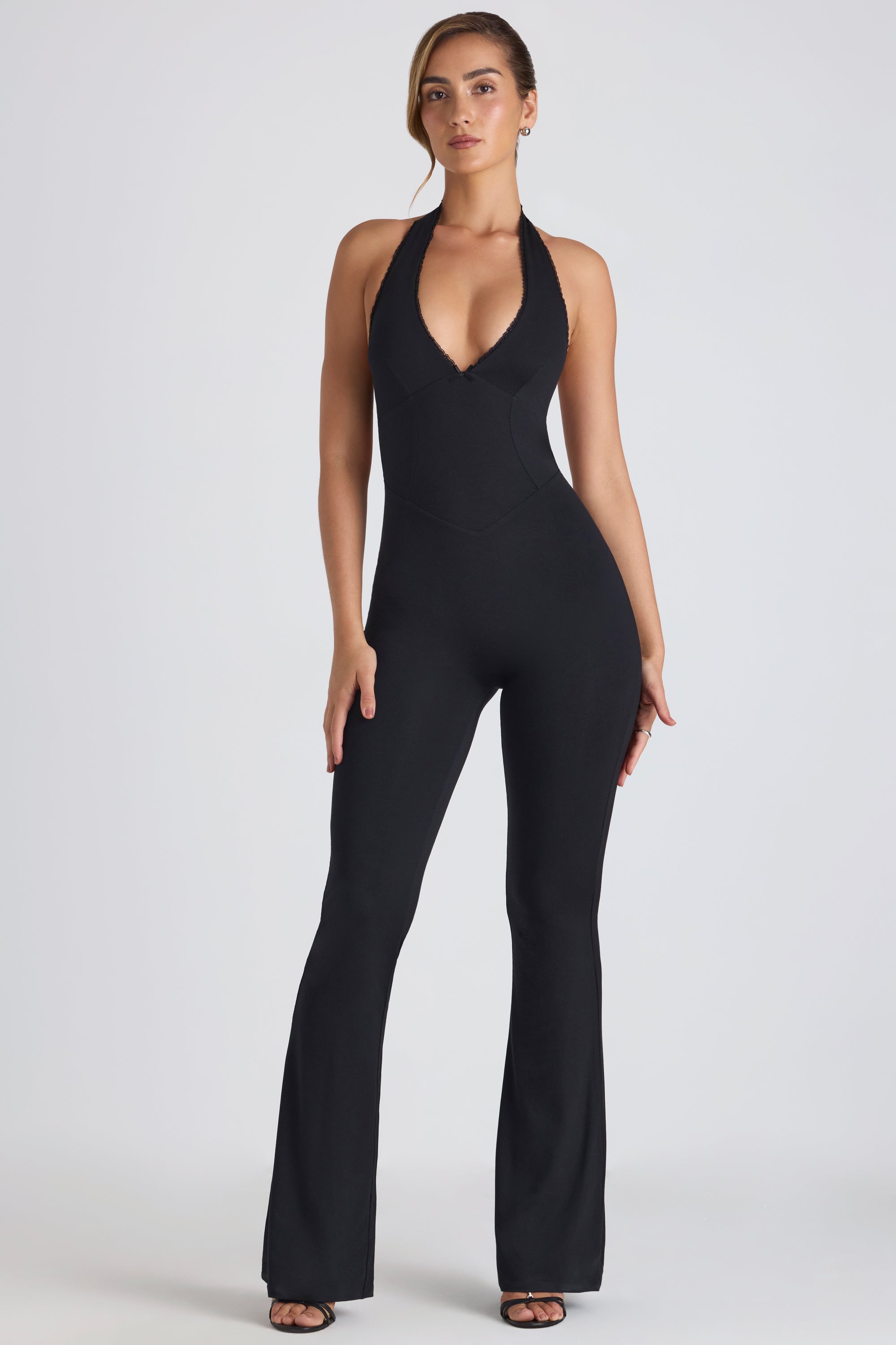 Pema Modal Lace-Trim Cut-Out Flared Jumpsuit in Black | Oh Polly