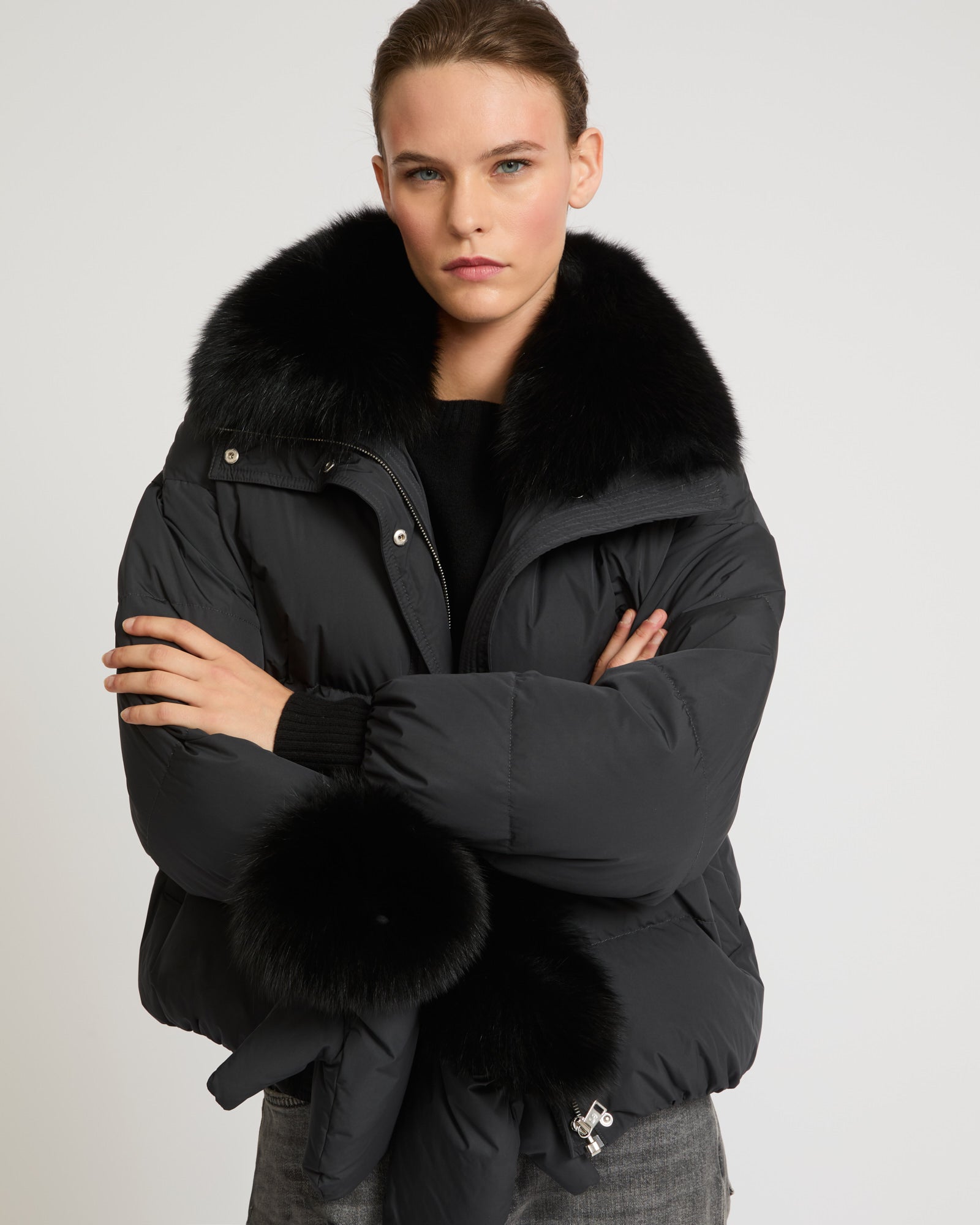 Boxy down jacket in waterproof technical fabric with fox fur