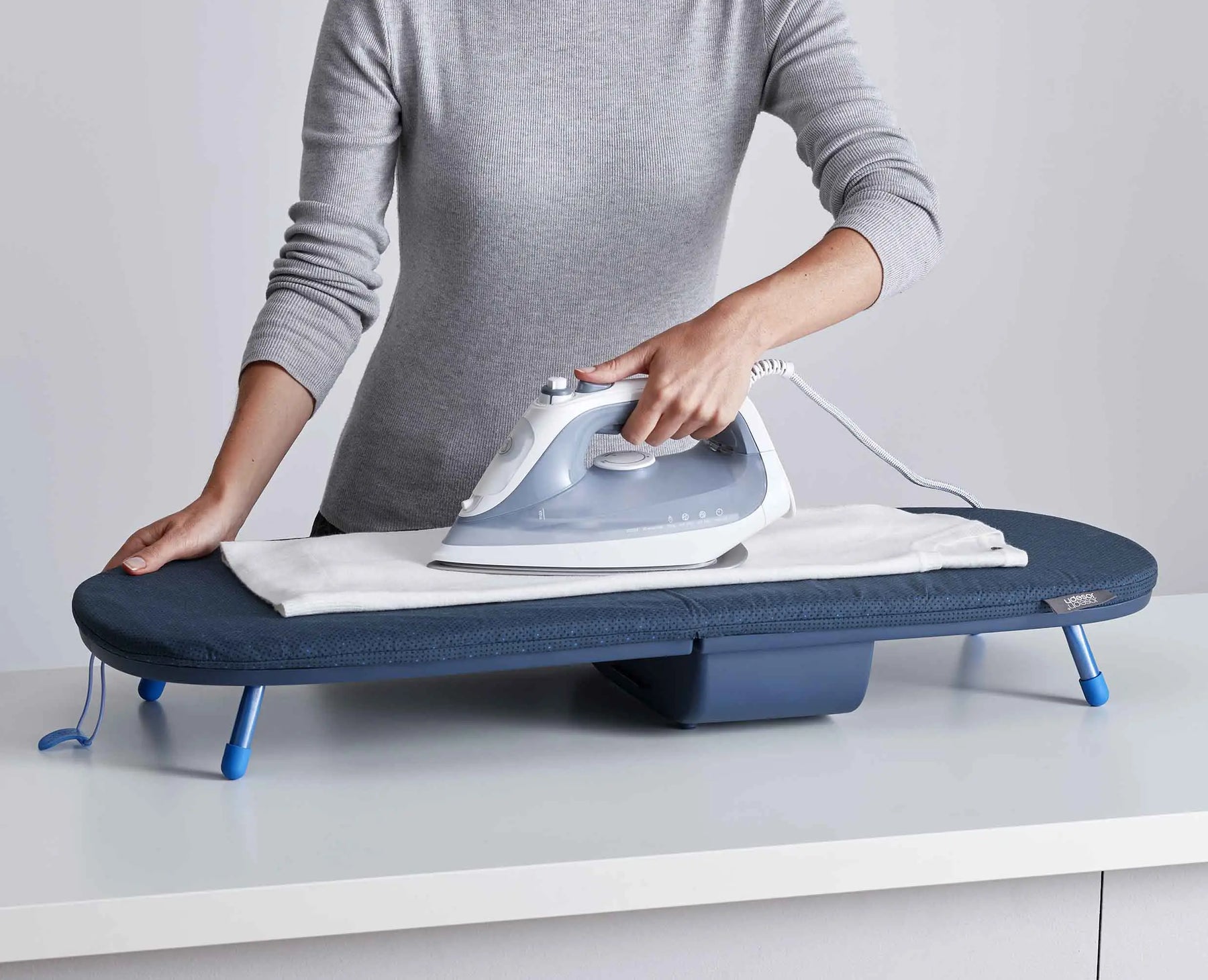 Compact Folding Ironing Board Blue | Joseph Joseph US