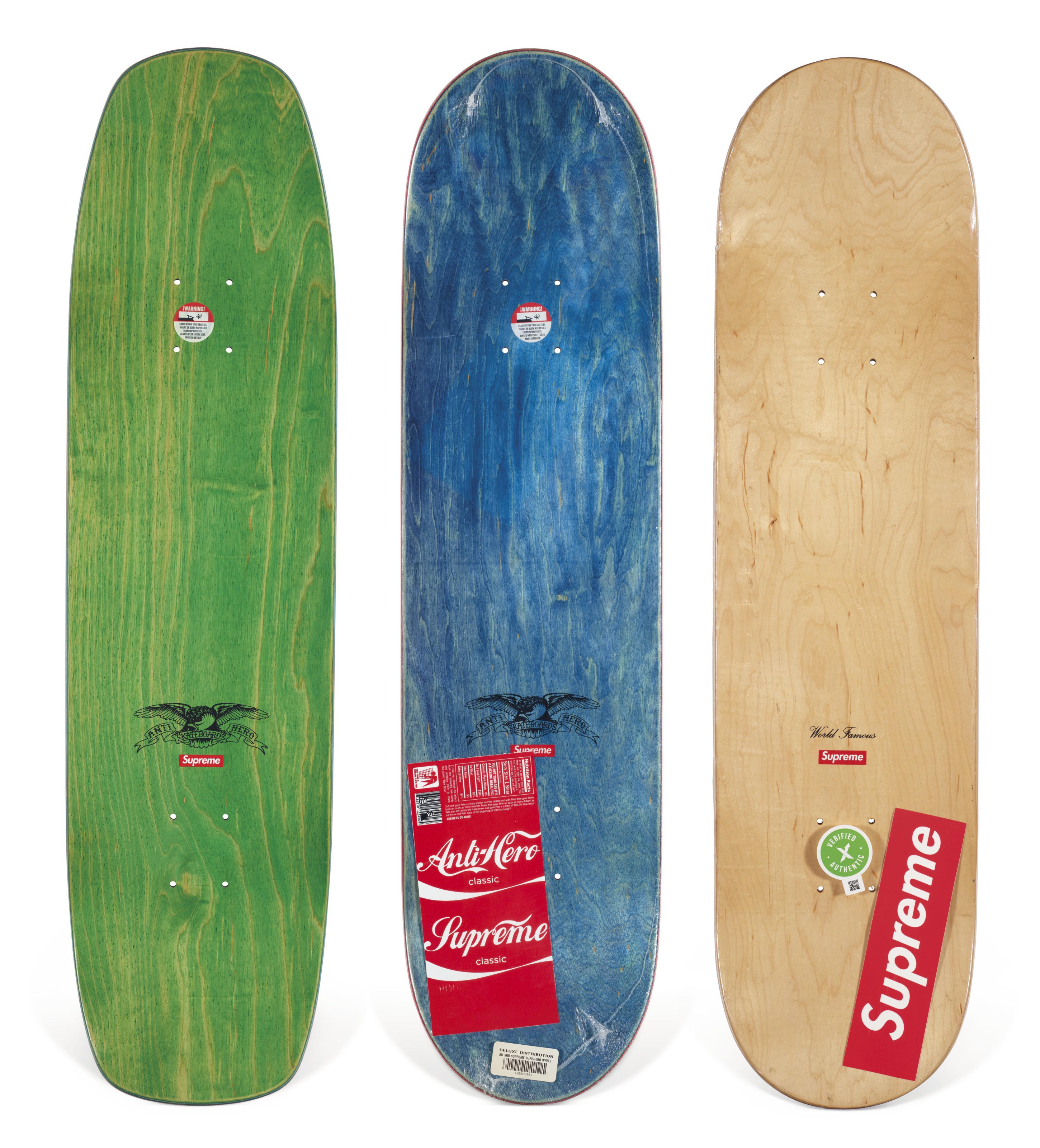 A SET OF THREE SUPREME X ANTIHERO SUPR-HERO SKATEBOARDS, SUPREME