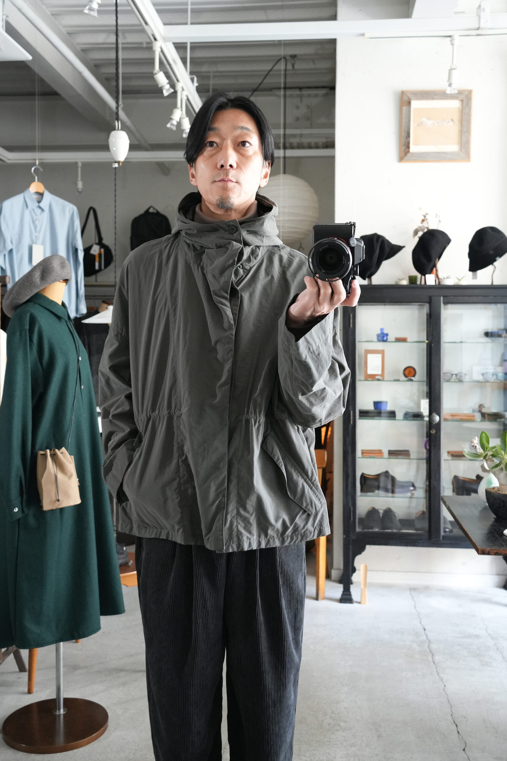 FIRMUM」ナイロンタッサーガーメントダイショートモッズコート