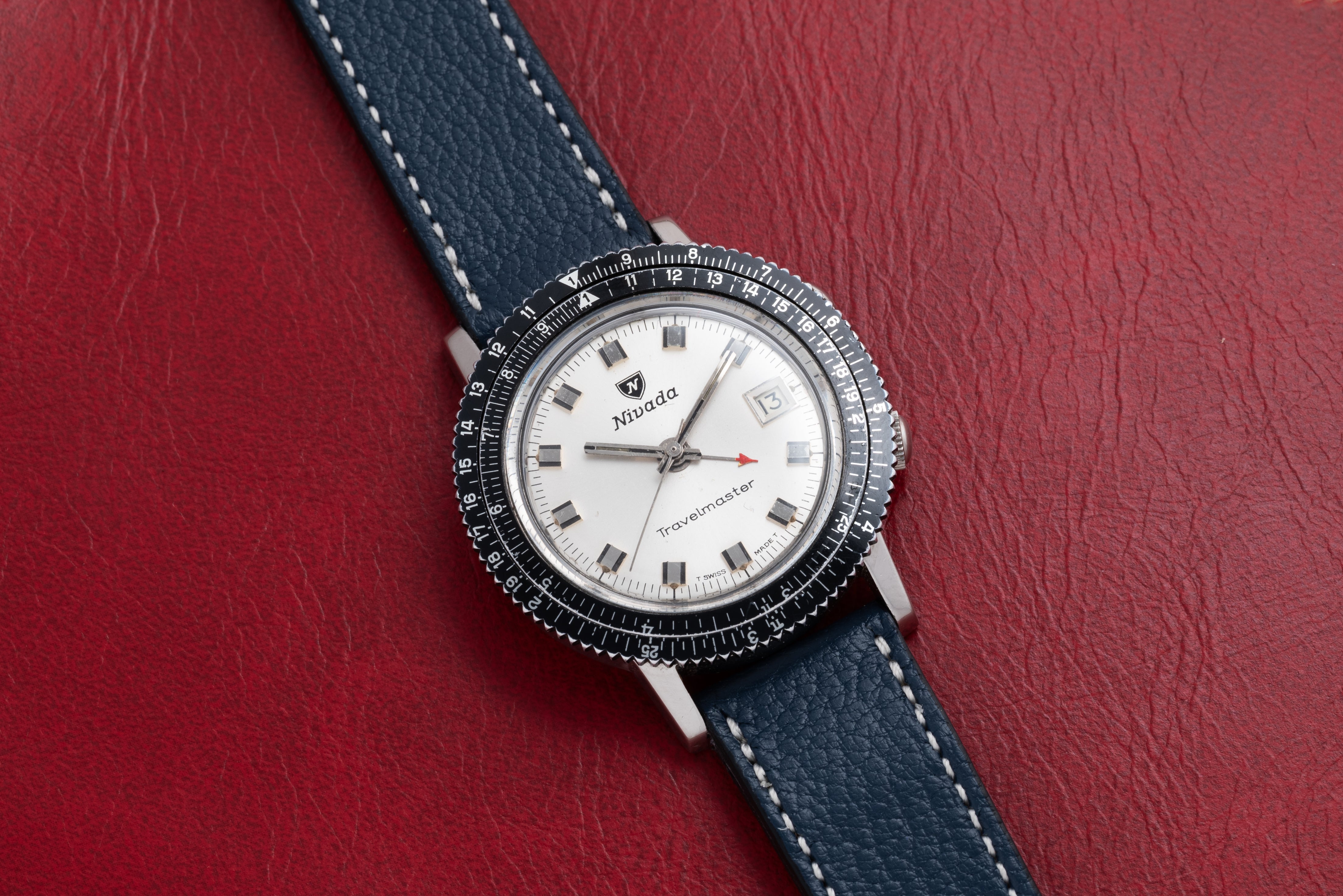 Nivada Grenchen Travelmaster Alarm – Analog:Shift