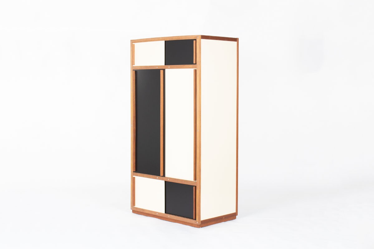 Cabinet this tigette system from French cabinetmaker Andre Sornay