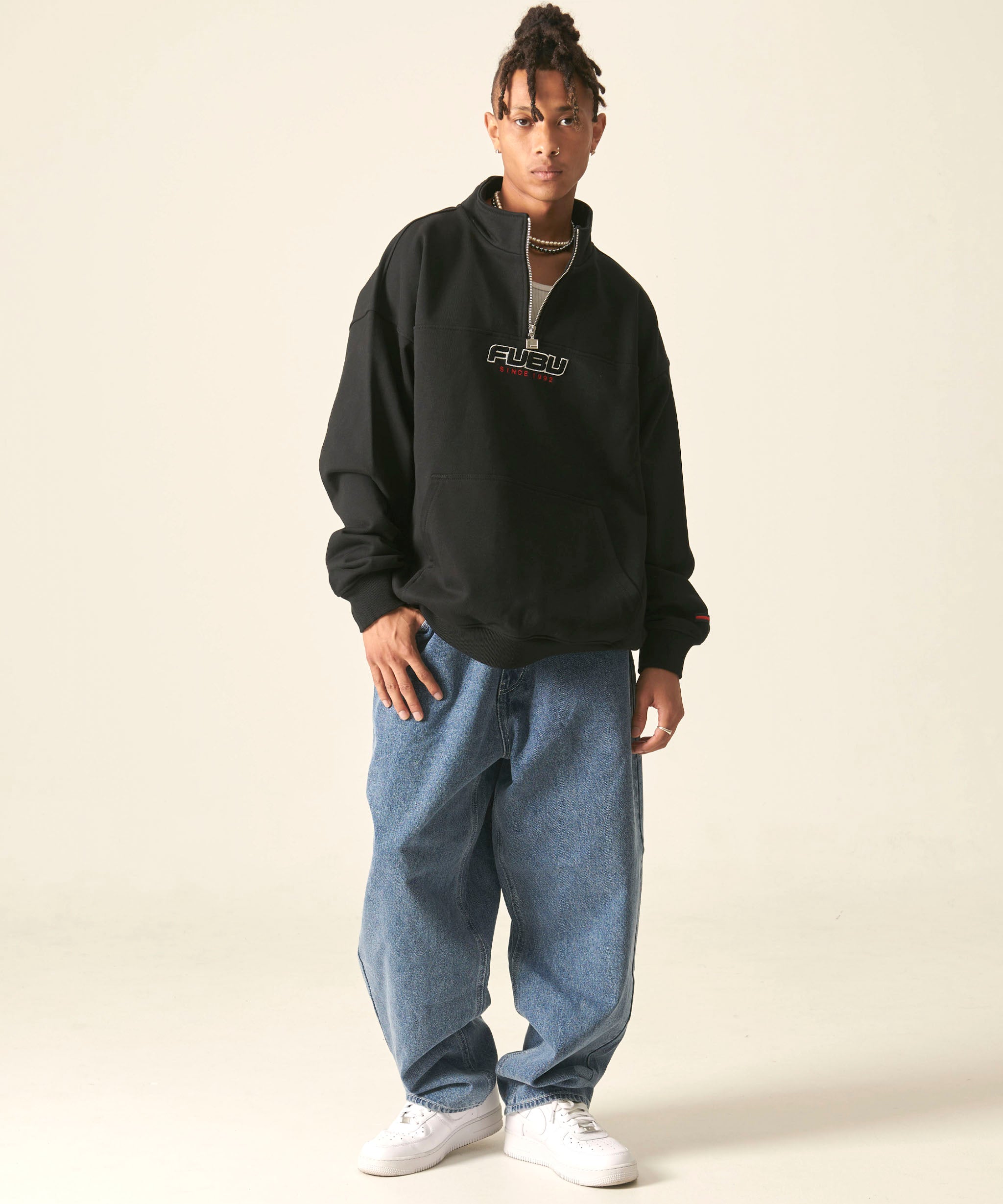 FUBU フブ トップス 裏毛 ハーフジップ スウェット。FUBUはアメリカの