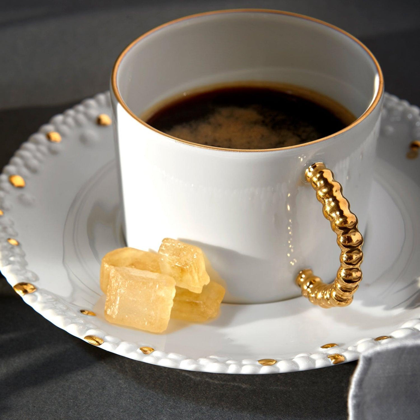 Haas Mojave Tea Cup + Saucer - White + Gold - L'OBJET