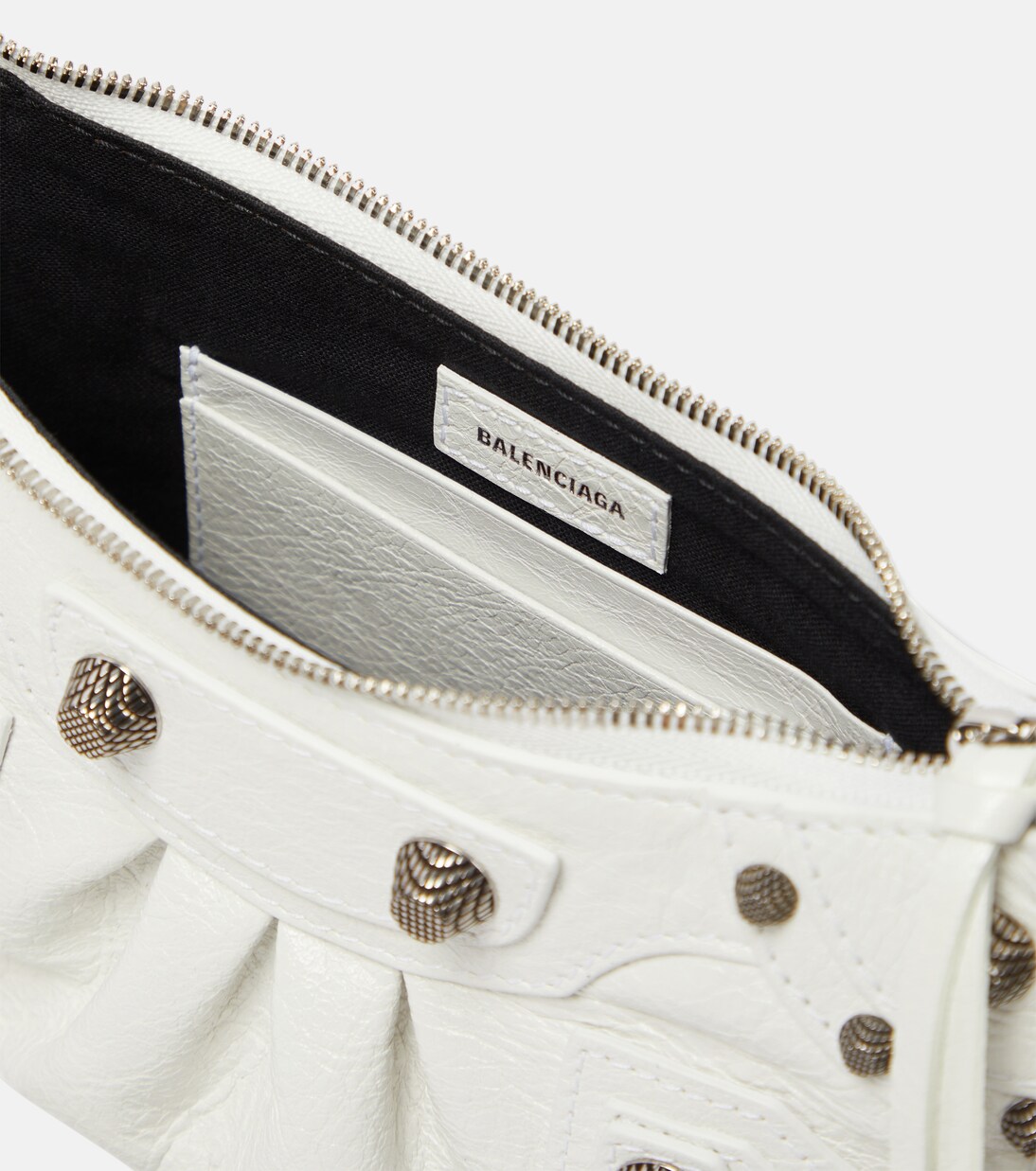Le Cagole Mini leather shoulder bag in white - Balenciaga | Mytheresa