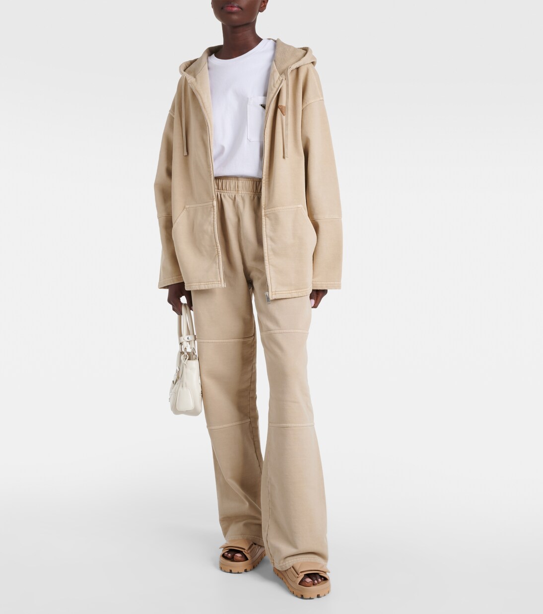 Oversized cotton zip-up hoodie in beige - Prada | Mytheresa