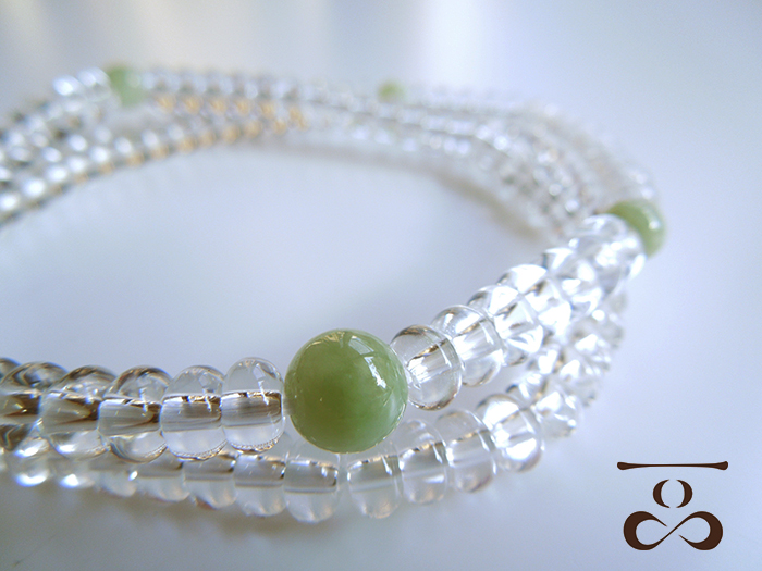 一品(ひとしな)】108ブレス「水晶×ビルマ翡翠」 お数珠の安田念珠店へ