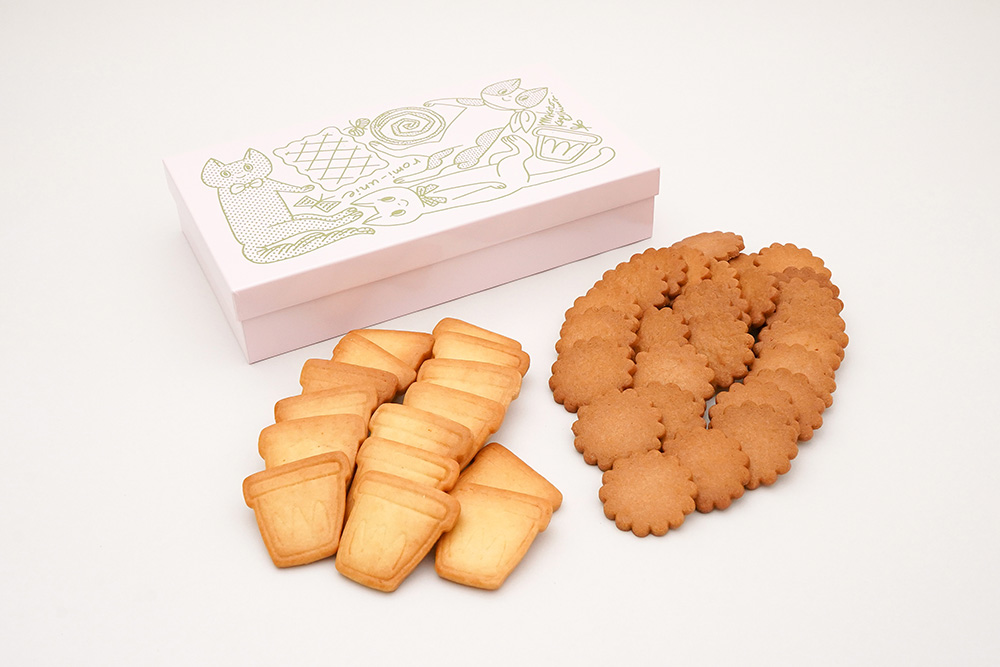 鹿児島睦さんデザインの缶にお店で人気のサブレを詰め合わせ ｜romi