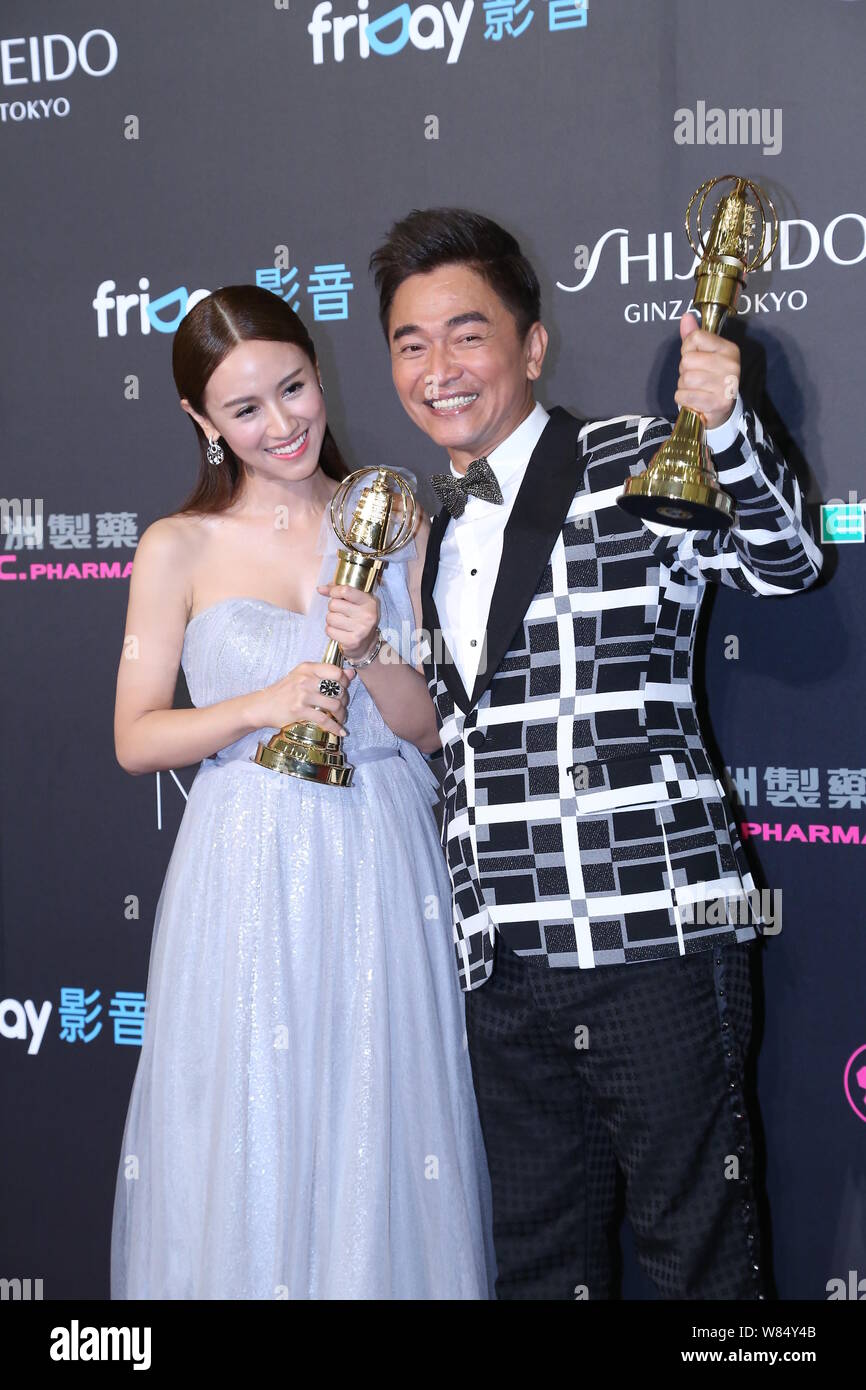 Taiwanese actor and variety show host Jacky Wu, right, and his