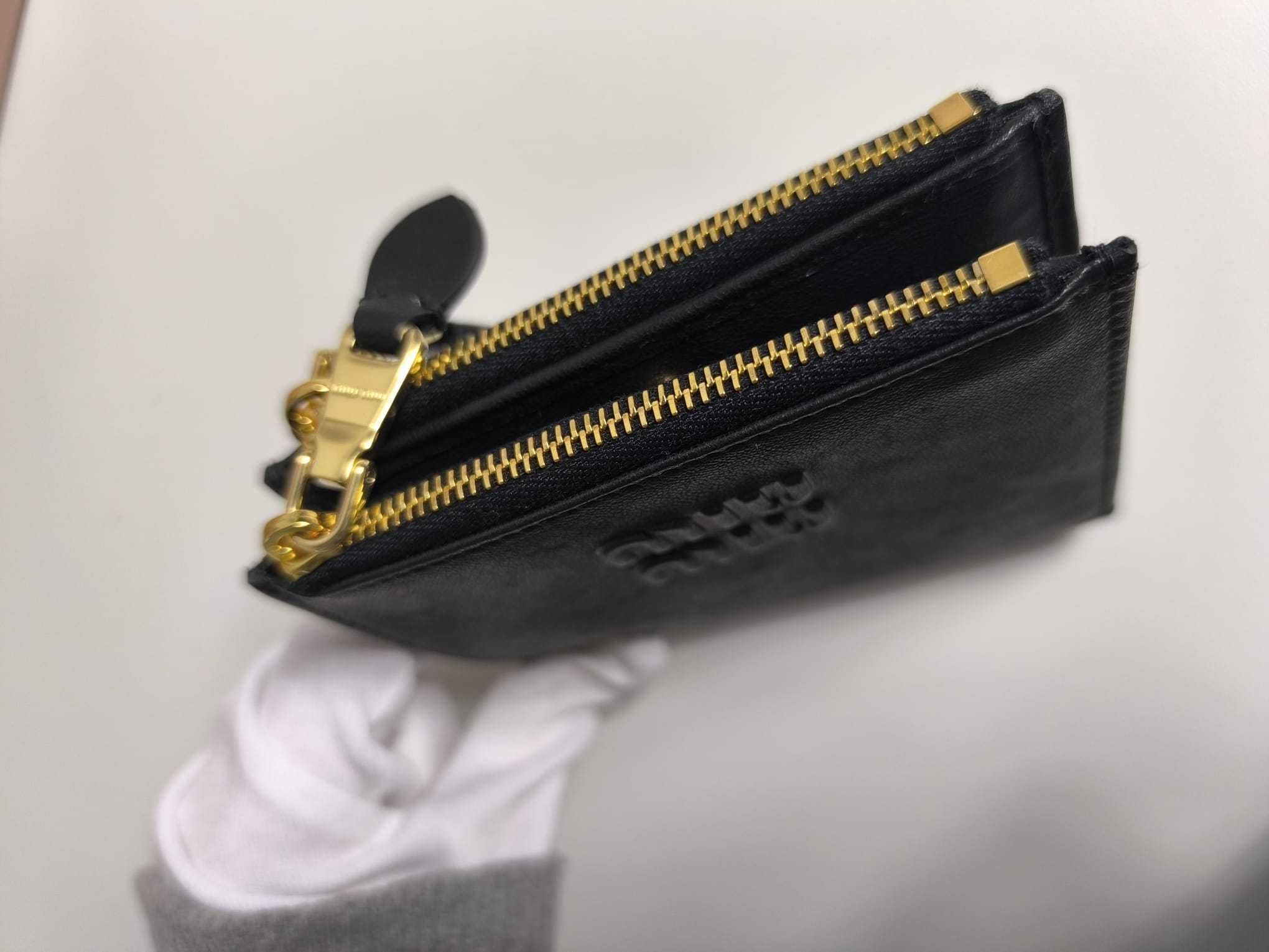 ミュウミュウ【Miu Miu】 ナッパレザー 二つ折り財布 (MiuMiu
