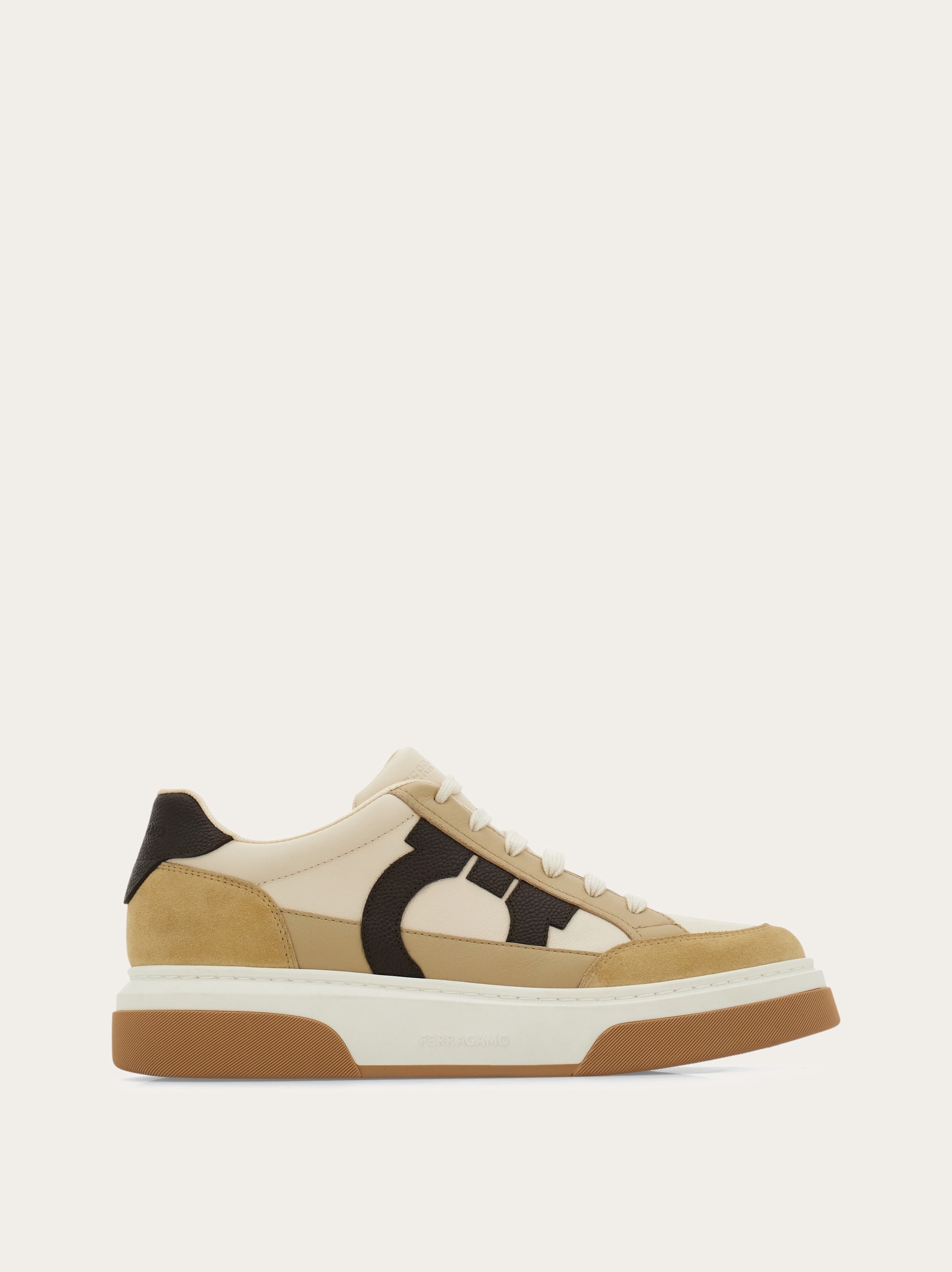 Low-top sneaker with Gancini detail - Men | Ferragamo