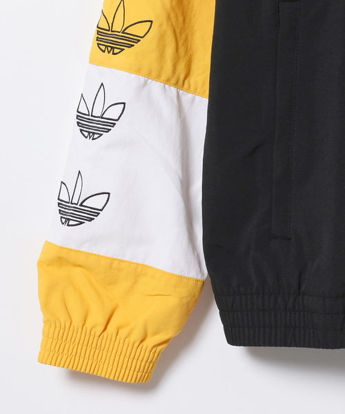 adidas（アディダス）の「adidas / ブロックド ウォームアップ