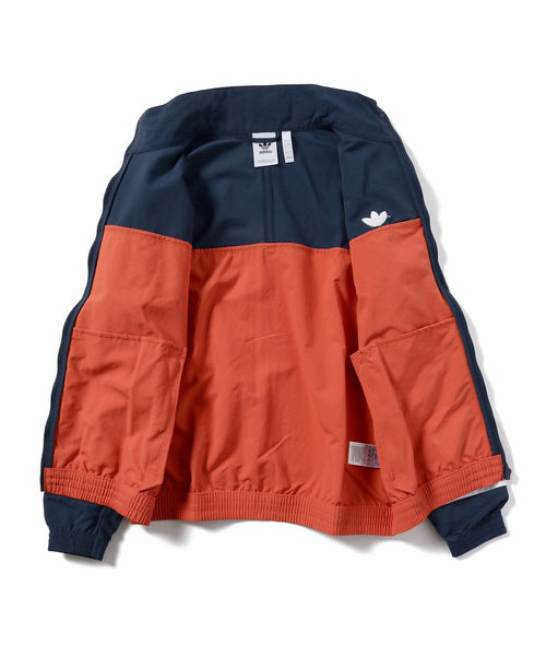 adidas（アディダス）の「adidas / ブロックド ウォームアップ