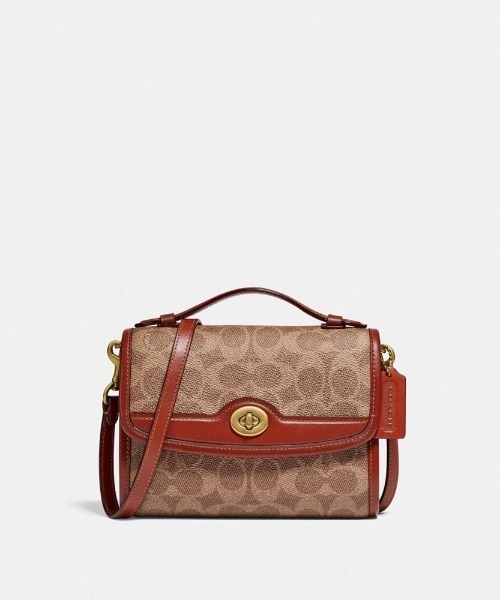 COACH（コーチ）の「キップ ターンロック クロスボディ シグネチャー