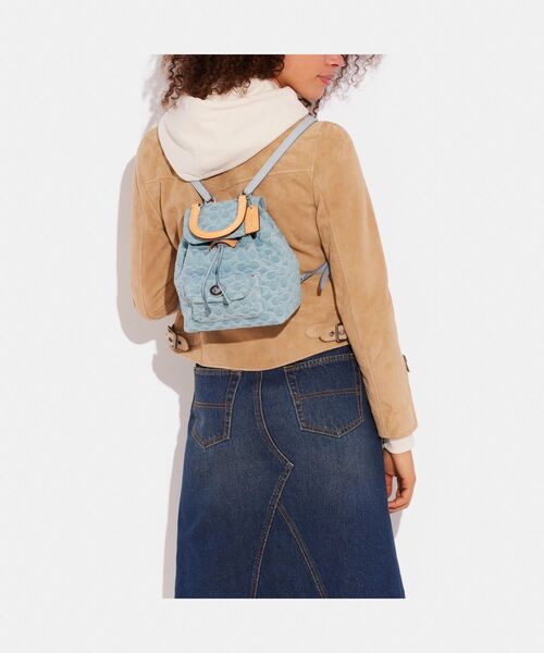 COACH（コーチ）の「リア バックパック 21・シグネチャー デニム
