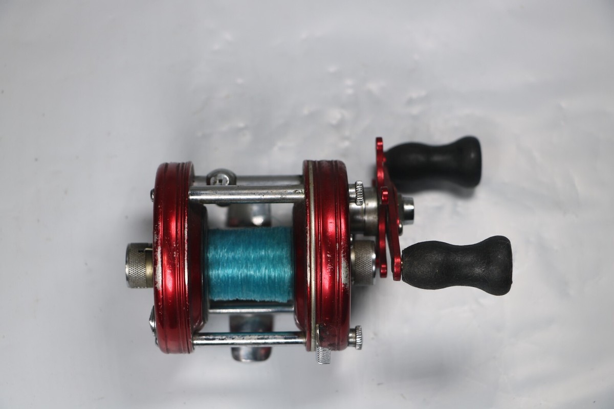 Vintage Abu Ambassadeur 5000 Red 4 Screw Fishing Reel for sale