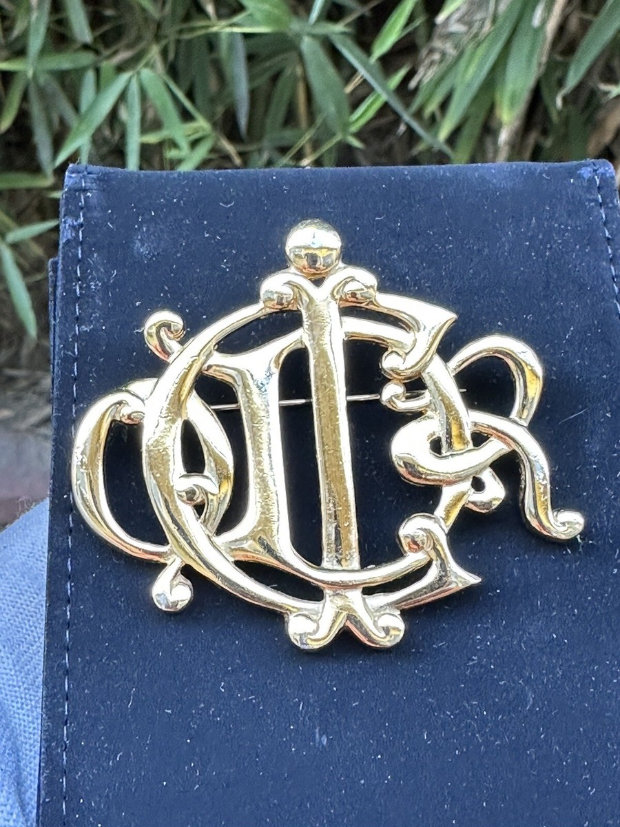 Genuine vintage CHRISTIAN DIOR intertwined logo crest brooch pin