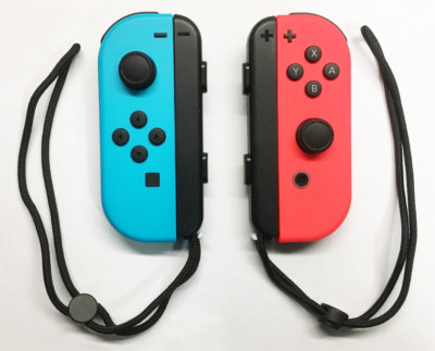 Genuine Nintendo Switch - Joy-Con (L/R)- Neon Blue (L) Neon Red (R