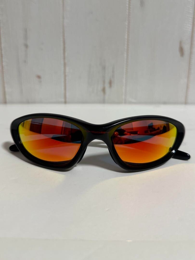Oakley Twenty XX sunglasses made in the USA Jet Black Lens: Ruby