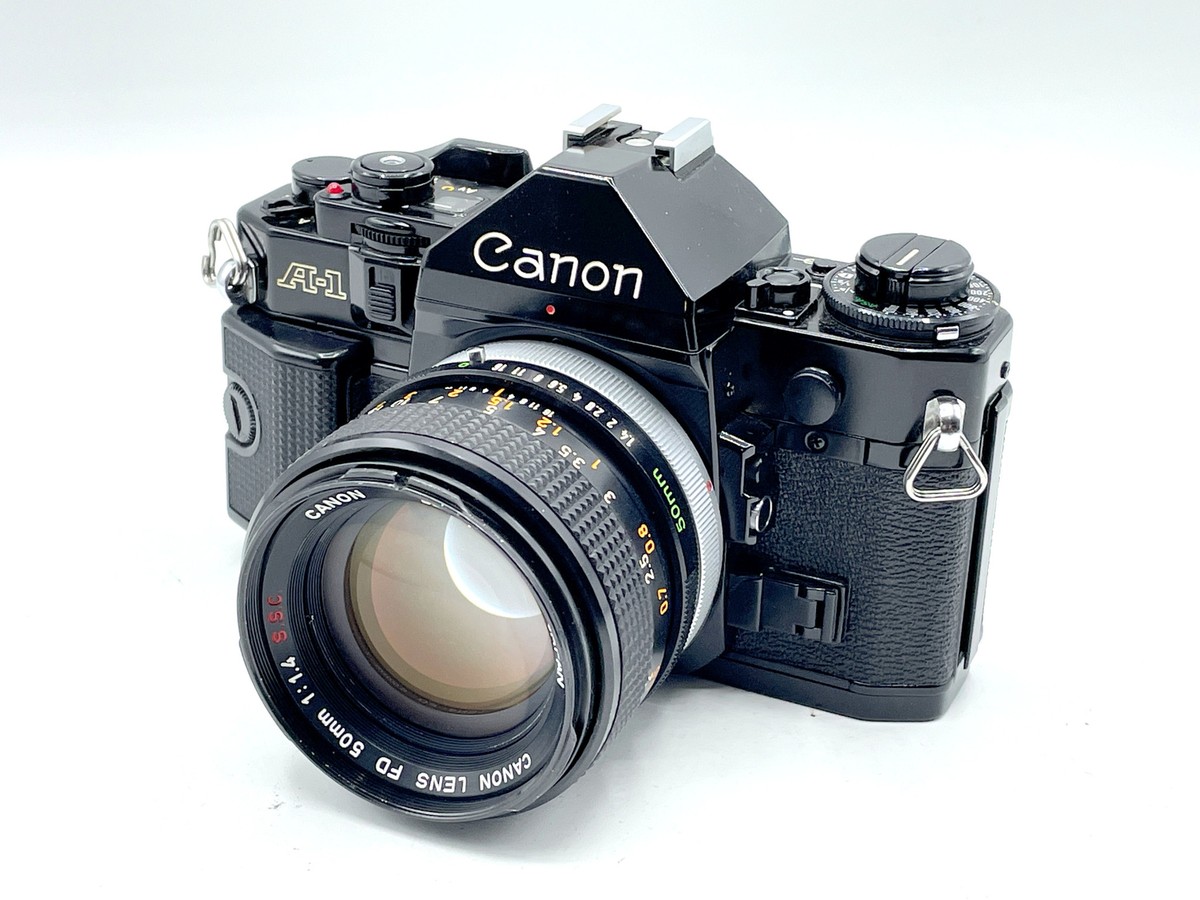 Black Canon A-1 + Canon 50mm f/1.4 SSC Lens Manual Film Camera Kit