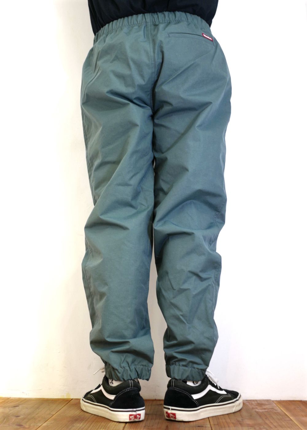 HIDE AND SEEK - NYLON TRACK PANTS (GRAY) / ナイロントラックパンツ