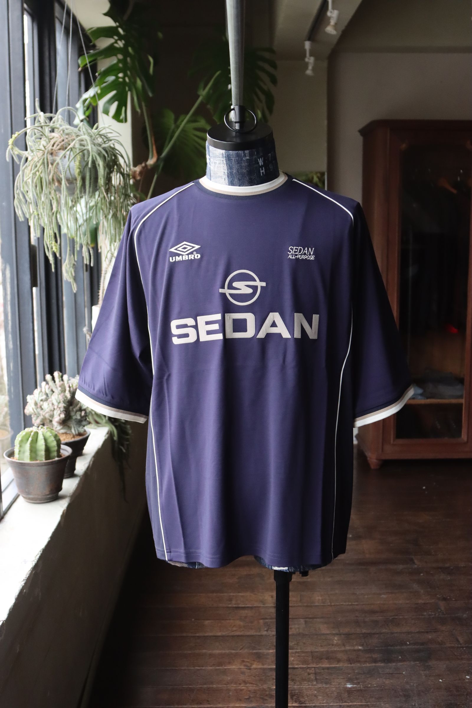 SEDAN ALL-PURPOSE - セダンオールパーパス SS24 UMBRO® S/S Game