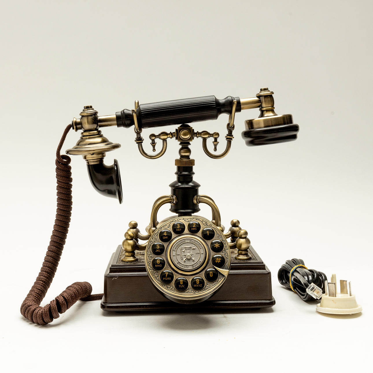 A desk phone, “No.1904