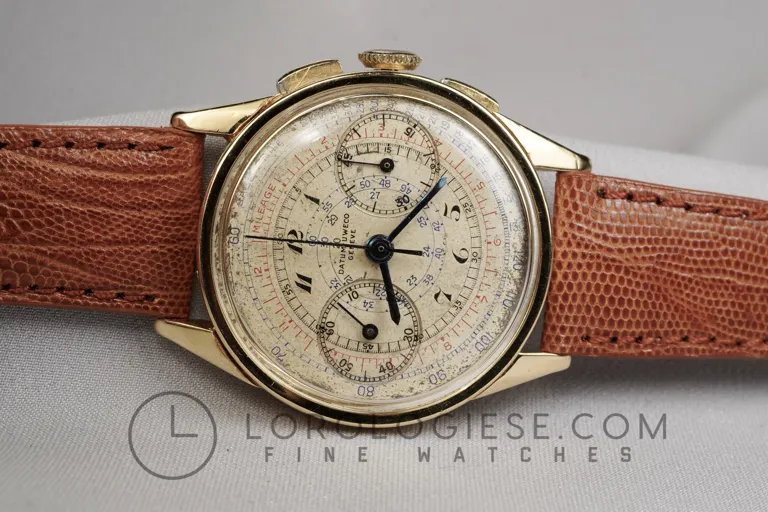 Universal Genève Datum Uweco 5166 18kt gold | Dealer | EveryWatch