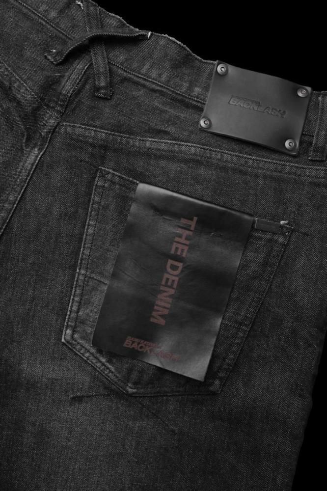 THE DENIM STRETCH SELVEDGE DENIM LOOSE FLARE PANTS “DARK.BLACK