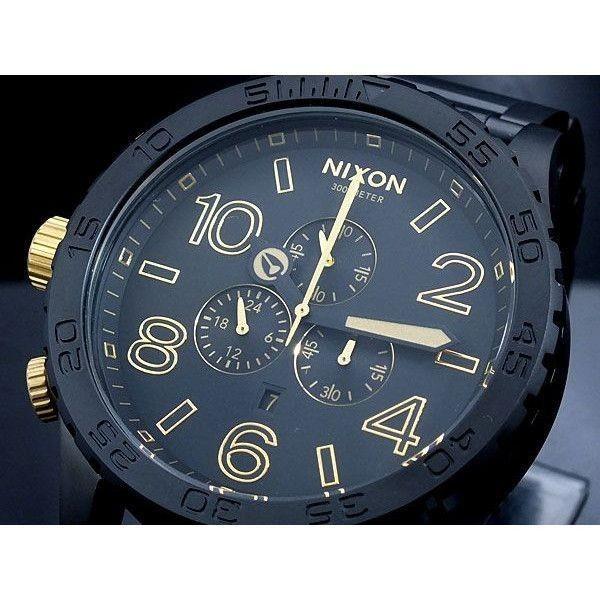 ア29/NIXONブラッククォーツ腕時計ムラサキスポーツ100店舗記念限定