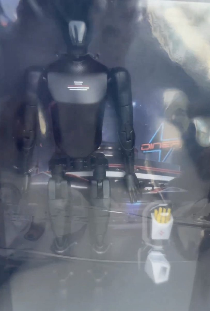 Tesla sells an exclusive all-black Tesla Bot action figure at