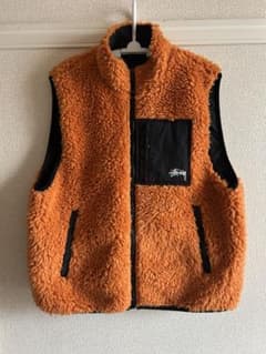 Stussy オレンジ フリース ベスト - メルカリ