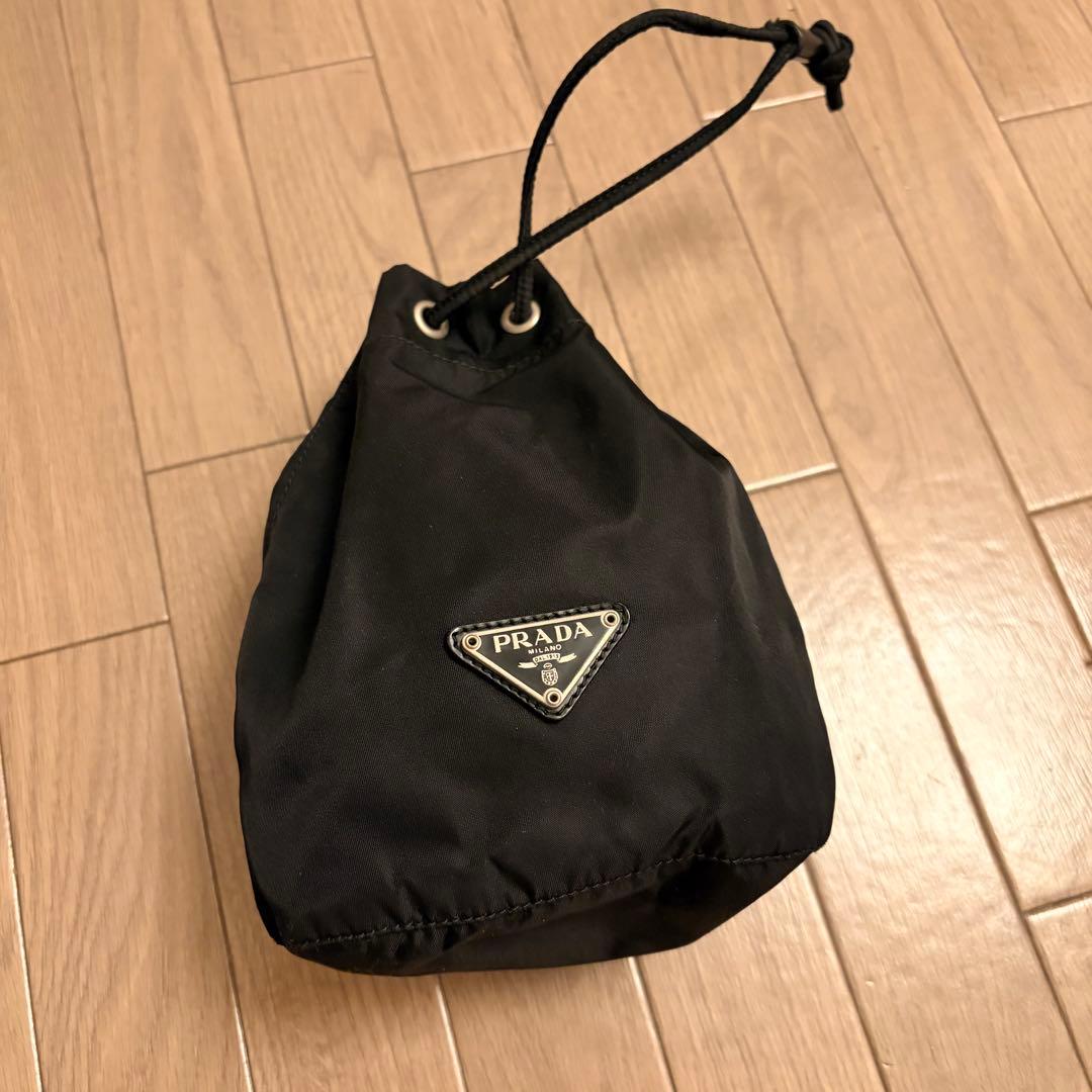 PRADA プラダ 巾着 ナイロン ポーチ 三角ロゴ ブラック - メルカリ