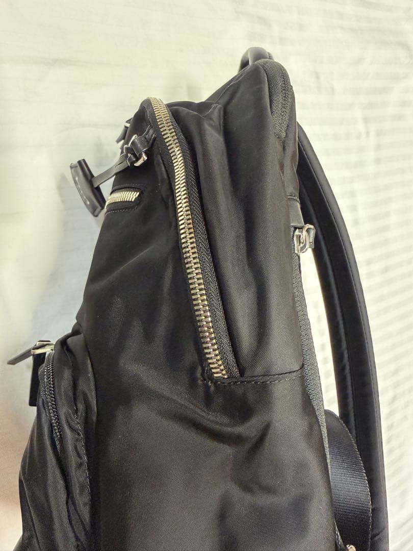 TUMI Voyageur ヒルデンパックパックブラック+シルバー ファッション