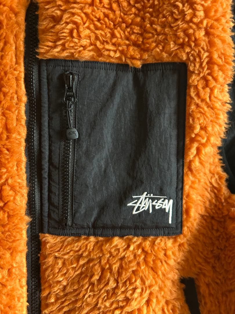 Stussy オレンジ フリース ベスト - メルカリ