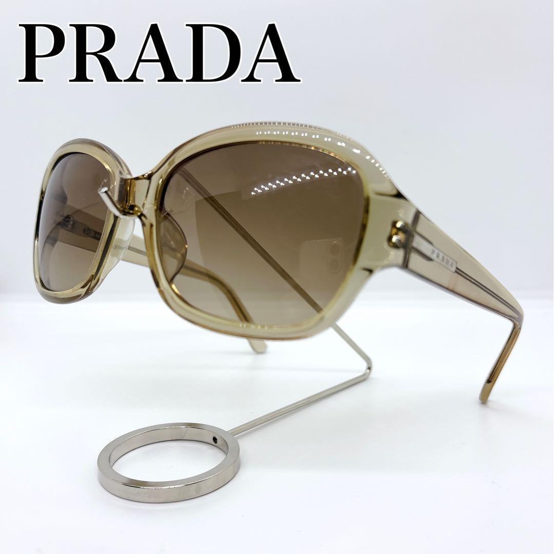 PRADA サングラス SPR26G サイドロゴ クリアフレーム ベージュ - メルカリ