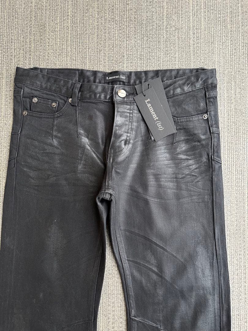 lament(ist) wax coating flare jeans