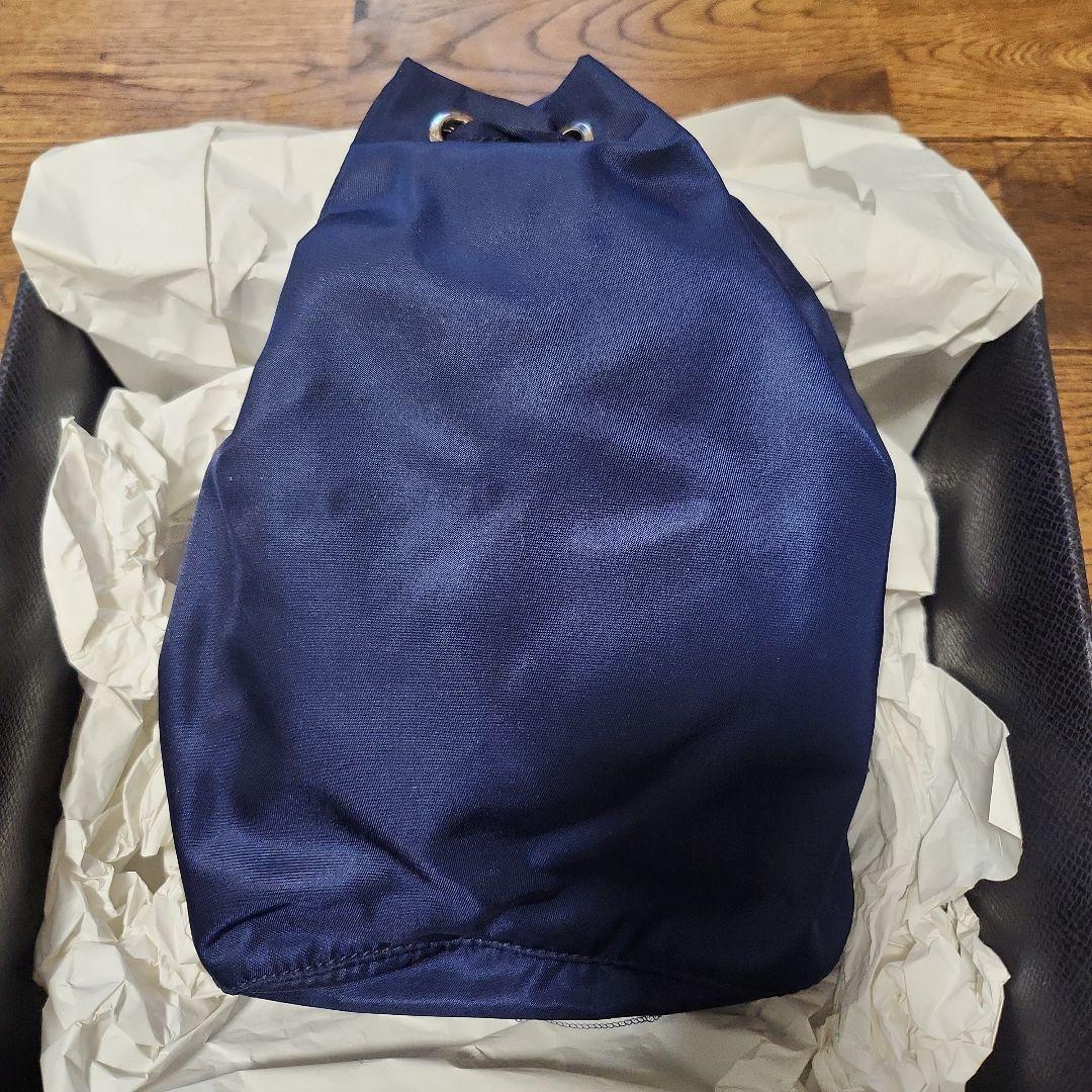 デヴィ様専用【未使用品】PRADA 巾着ポーチ ネイビー - メルカリ