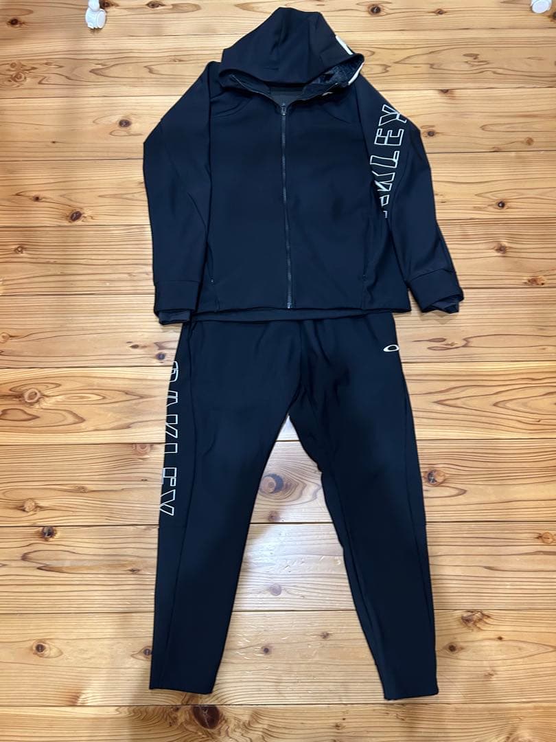 週末価格！オークリー　シンクロニズムウォーム上下 ウインドブレーカーXL OAKLEY（オークリー） メンズ EN 3RDG SYNCHRONISM JACKET 7.7