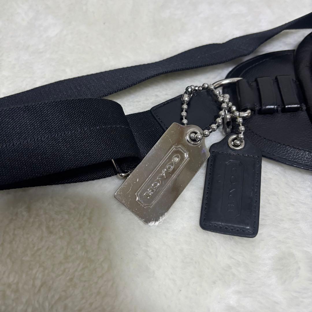 コーチ ボディバッグ トンプソン 本革 斜め掛け ロゴ型押し ブラック