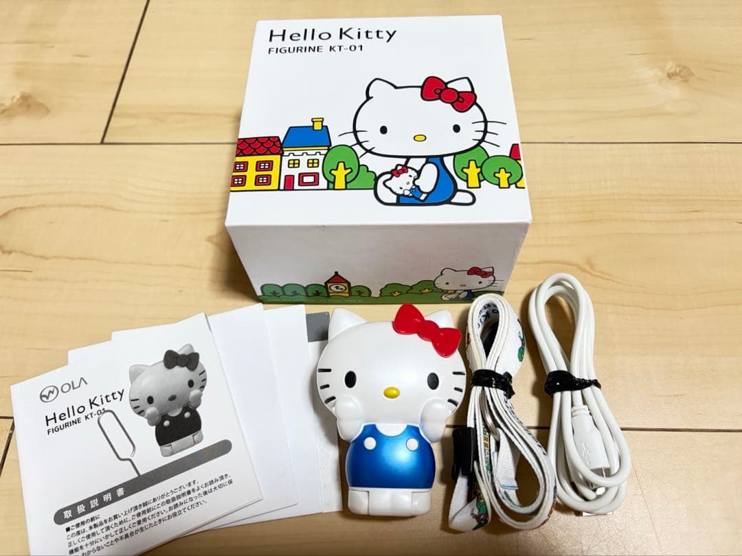 サンリオ ハローキティ SIMフリー フィギュア 携帯 FIGURINE OLA ASCII.jp：キティさんの二つ折りSIMフリー携帯電話、1万2000円台