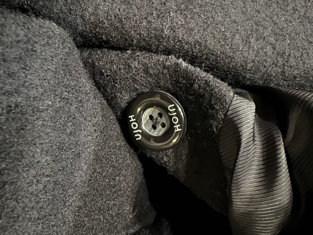 UJOHウジョー 日本製 ウールツイードサイドボタンロングチェスター