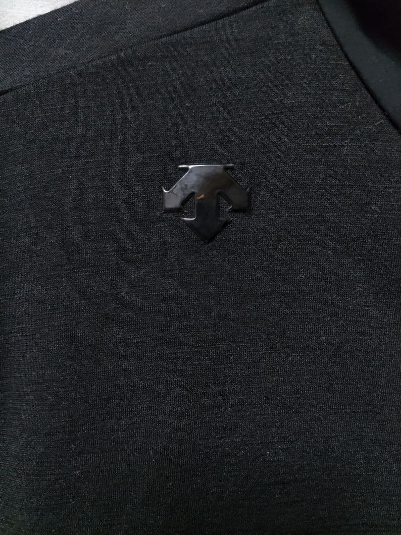 デサントゴルフ ウール ミックス ジップアップパーカー 黒 - メルカリ