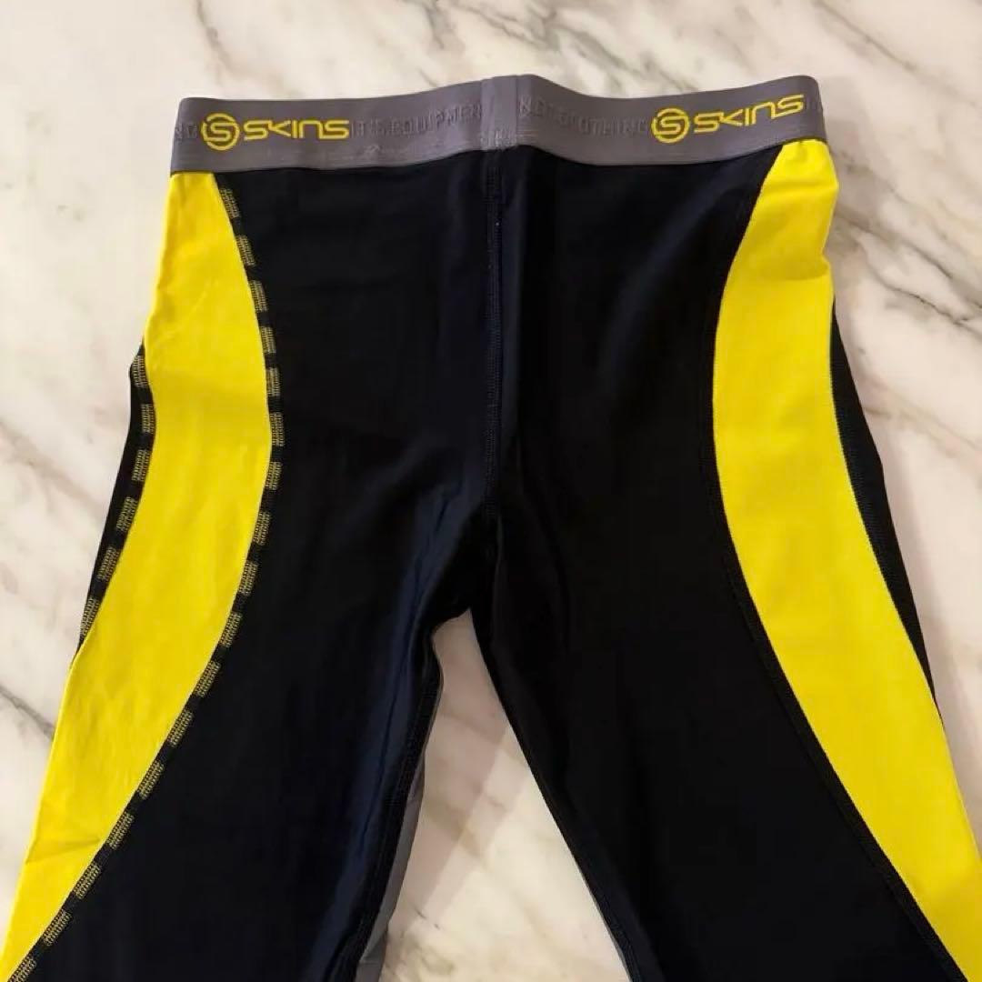 DNAMIC DK9905001 ロングタイツ 黒×黄 デサント国内正規 ECM