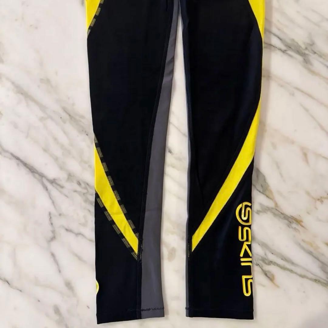 DNAMIC DK9905001 ロングタイツ 黒×黄 デサント国内正規 ECM