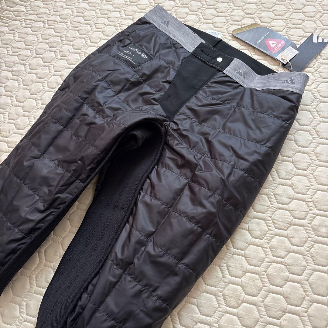 85新品27500円アディダスゴルフ/メンズ/秋冬/中綿ストレッチパンツ/黒
