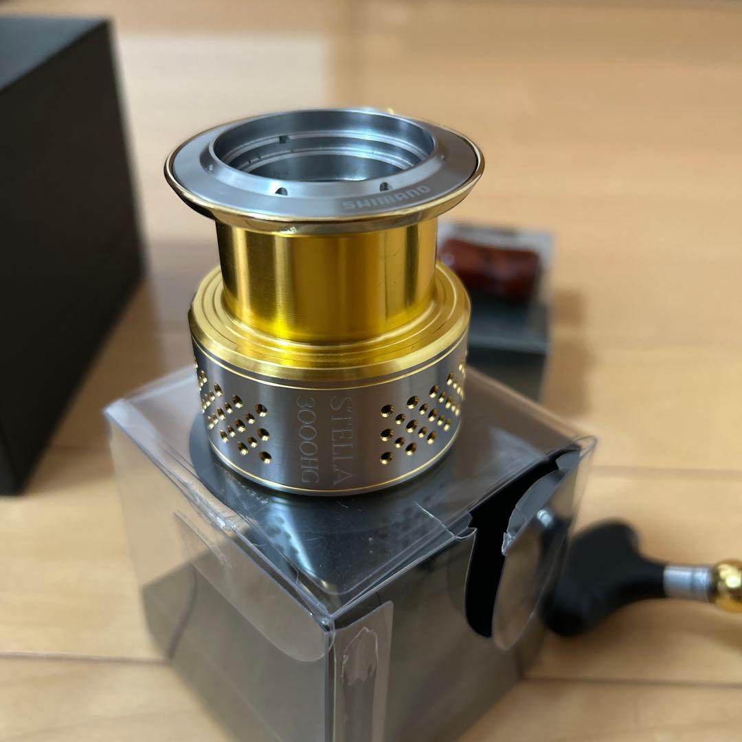 SHIMANO STELLA 3000HG 夢屋花梨ウッドノブ 替えスプール - メルカリ