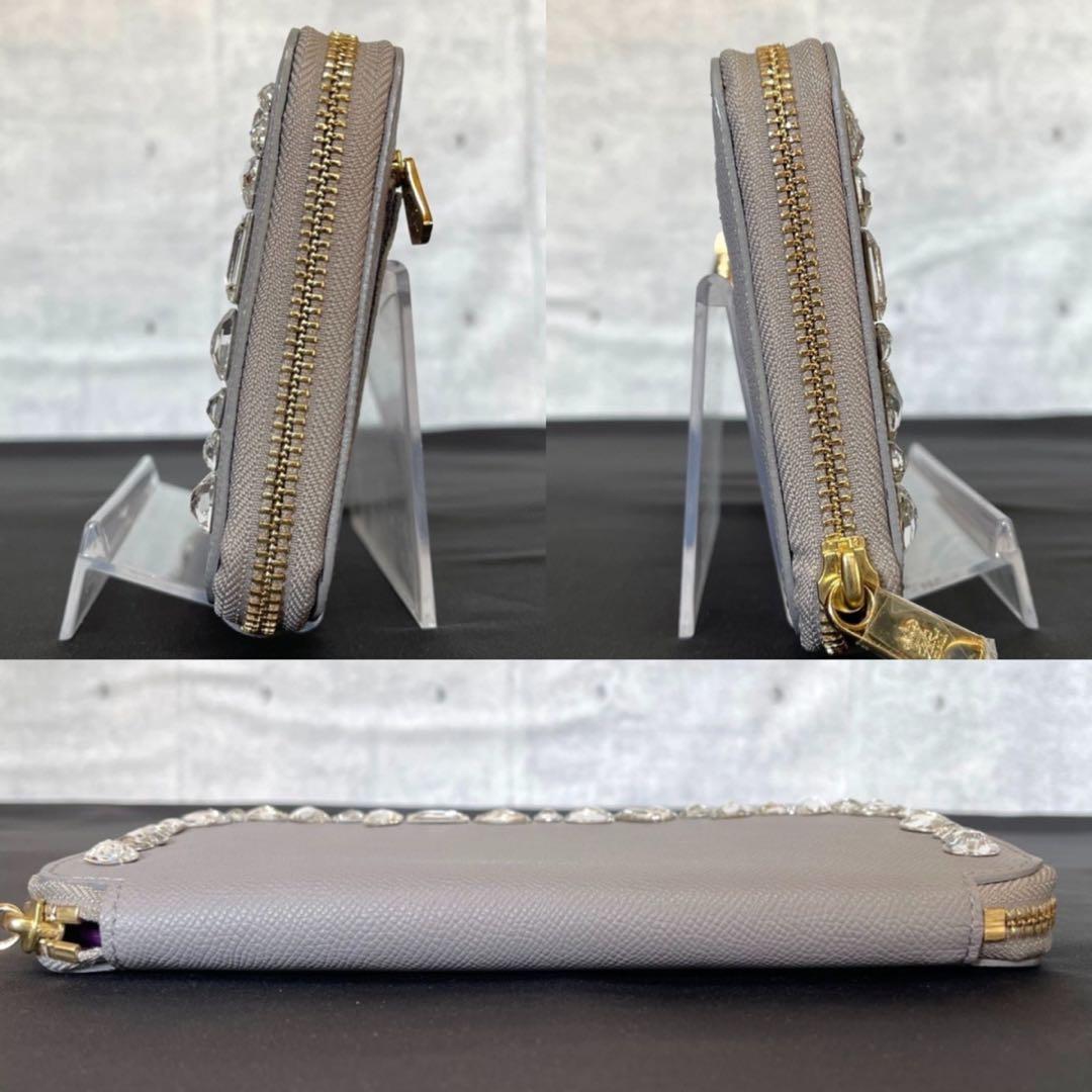 新品同様】A.D.M.J スワロフスキー グレー ラウンドジップ ウォレット
