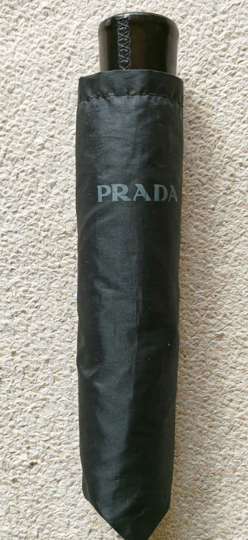 PRADA プラダ折りたたみ傘(雨傘) 黒 - メルカリ
